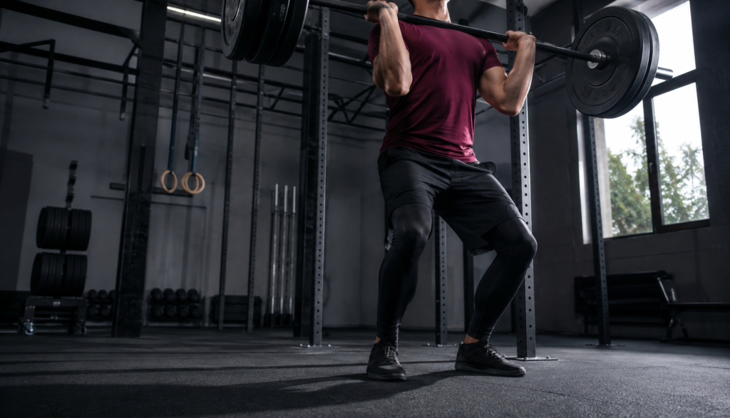 Low-angle view of overhead press setup at shoulder height